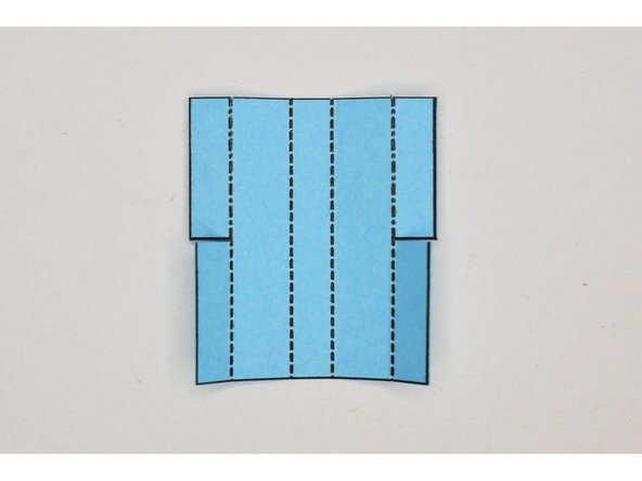 Prefold the wing holder.