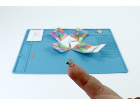 Use one of your two remaining Maker Tape sections to make a tape loop as shown.