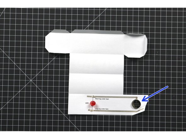 Stick the battery in place (negative side down).