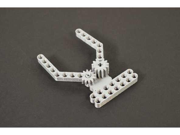 For the finger with the shorter gear section we'll use the LEGO Pin without Friction Ridges (3673)