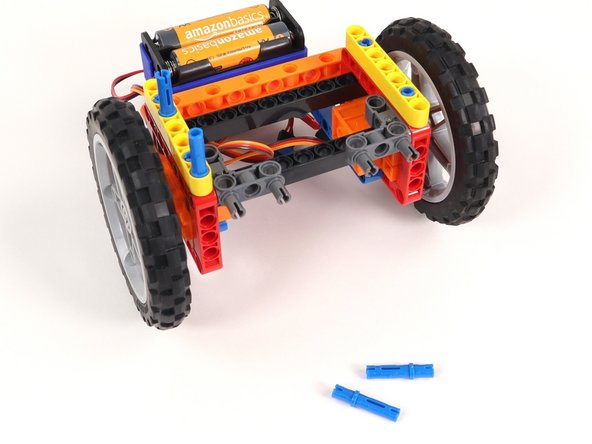 The long pins should go in 1/3rd of the way, so make sure you have the orientation correct. (2/3rds should stick out the top.)