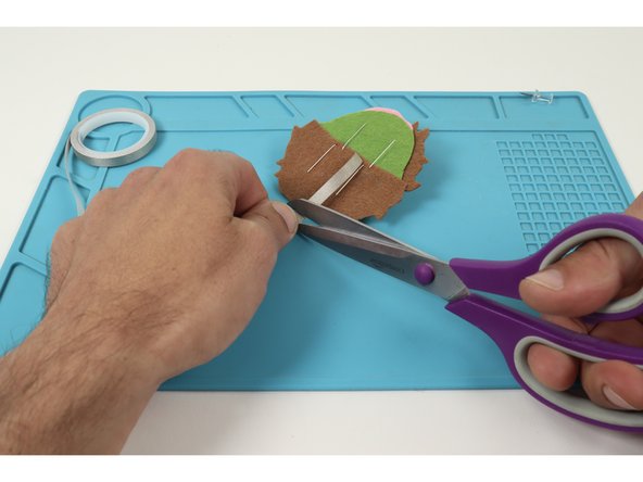 Cut 4 small pieces of 1/4&quot; Maker Tape that are about 2x the length of each LED leg.