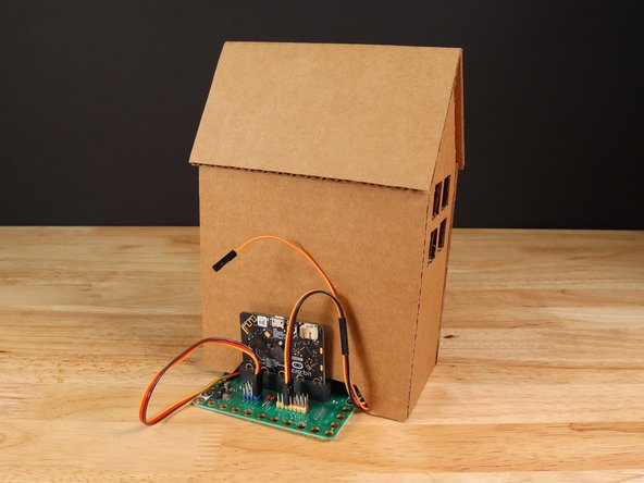 The micro:bit and Bit Board will be on the outside of the Haunted House in the back.