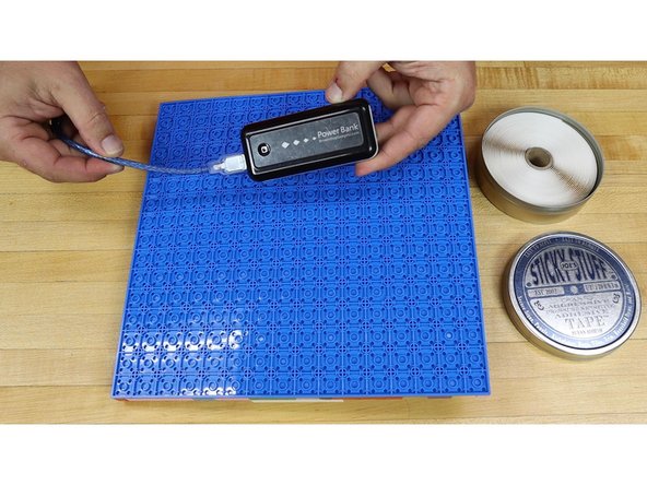 To make the LEGO Maze portable, you can add a battery pack.