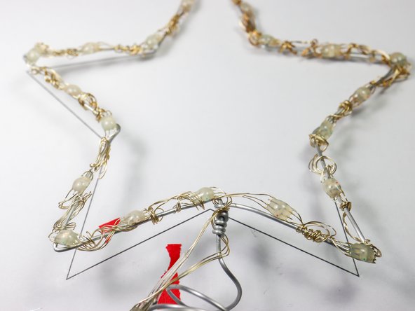 Tip: Wrap the NeoPixel strip onto a piece of cardboard before starting so they don't get tangled.