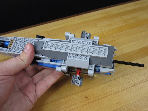 Rebuild the entire bottom of your X-Wing. Refer to the box and original directions.