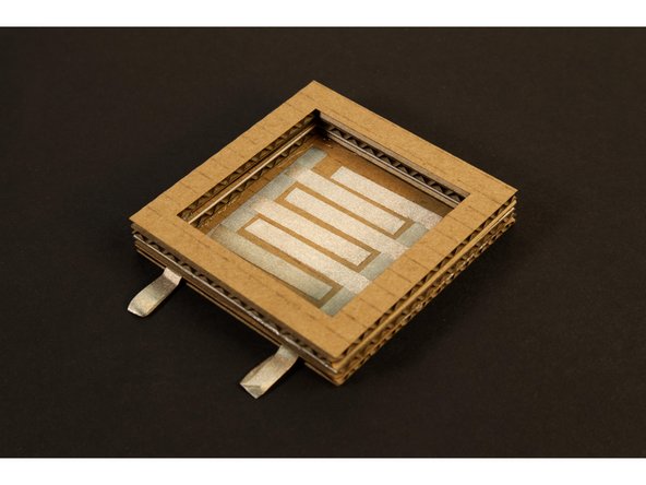 This will form the bottom half of our button, and the inside cavity that the Movable Contact will be placed in so it can be pressed down to touch the Maker Tape on the bottom that forms the Stationary Contact.