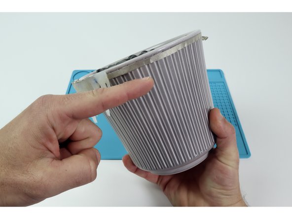 Now cut and connect another long Maker Tape path to the backside/positive path on the Molded LED array and run IT around the opposite side of the flower pot, eventually connecting it to the positive side of the battery.