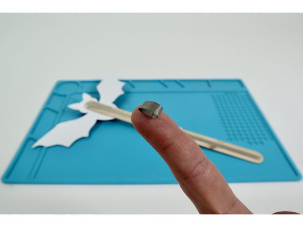 Stick that tape loop in place atop the far end of the long path from the previous step as shown.