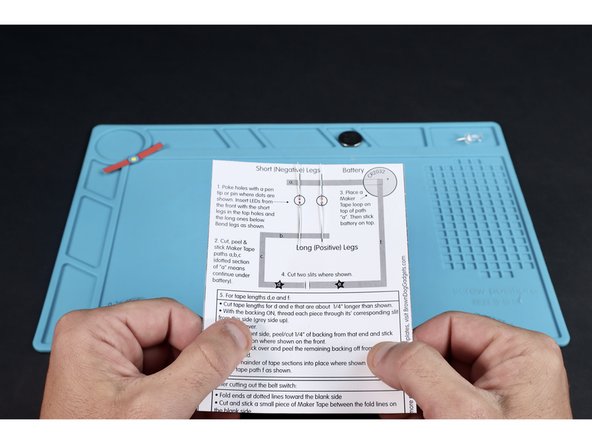Bend the legs of the two LEDs in opposite directions as shown.