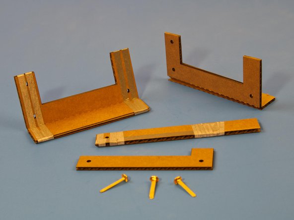 Use three brass fasteners to hold the switch together.