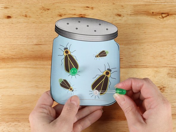 Insert LEDs into holes paying close attention to the orientation of the LED legs. Long legs are Positive and Short legs are Negative.