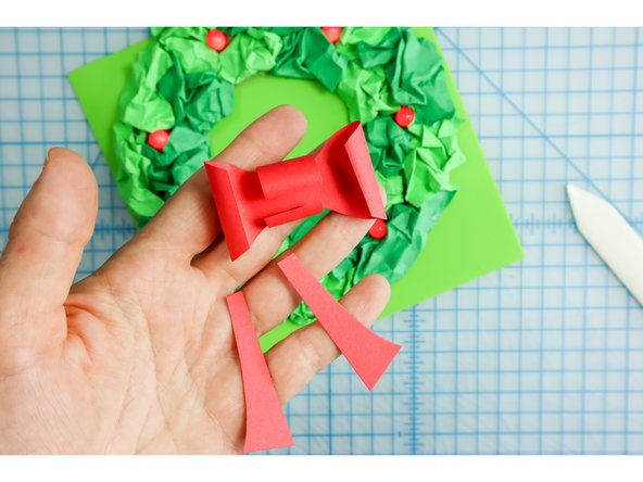 I used the bow template to cut a paper bow and glued it in place.