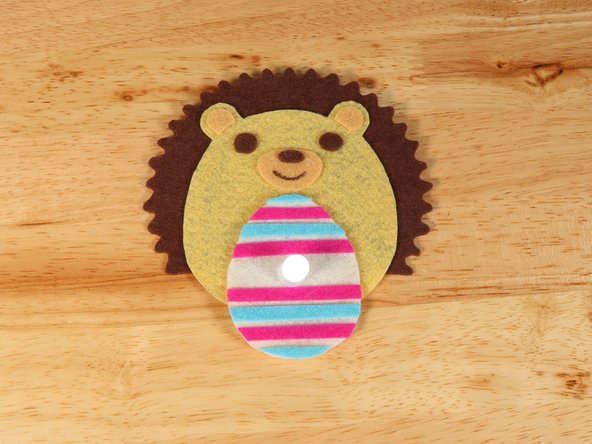 Use a black permanent marker to draw a mouth on the Hedgehog.