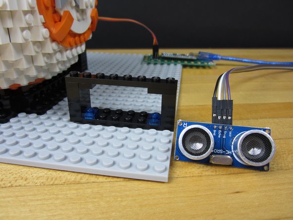 We went all fancy and included an Ultrasonic Motion Sensor. To make it look nice we build a small LEGO based holder for it to hang out in. We can't take credit for this design, we randomly found it in a google image search.