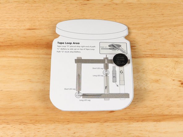 Add Maker Tape to tape path E.  over the top of the LED leg.