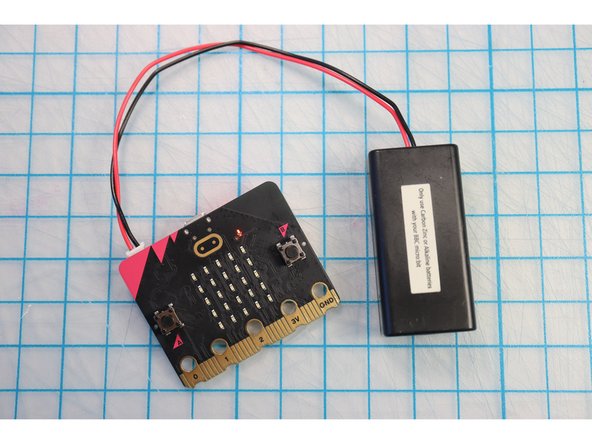 Download this code to a second micro:bit, and plug in a Battery Pack.