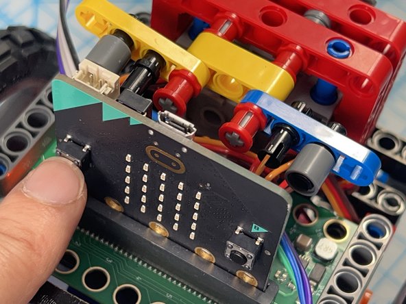 The code is set up so that you can press button &quot;A&quot; to move the arms to the up position and press button &quot;B&quot; to move the arms to the down position. The down position is default.