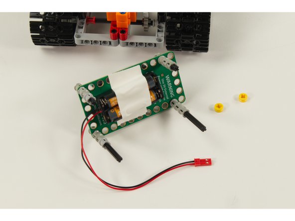 We chose a very simple method of adding the 2 AAA Battery Pack. We just taped it to the bottom of the Bit Board!