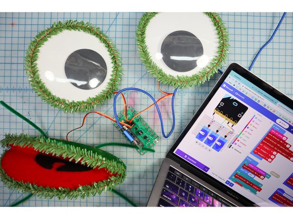 Insert the micro:bit into the bit board.