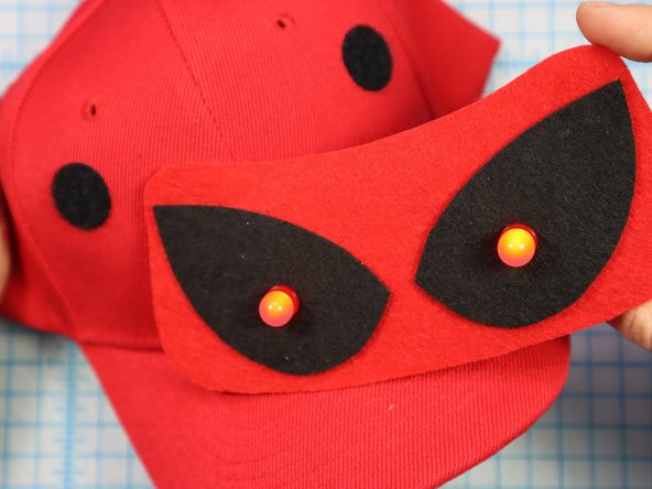 Carefully peel the hook and loop apart and squeeze each dot separately to set the adhesive.