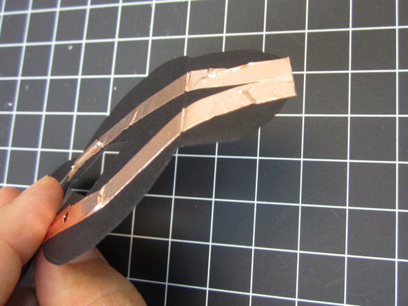 Run lines of tape from the Positive LED legs back round to the front.