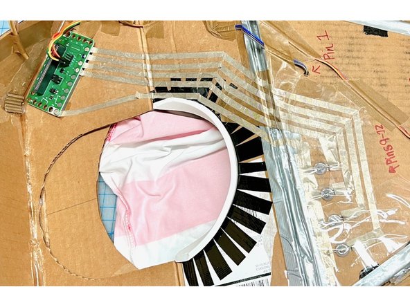 In our Sally Servo costume, we ran the traces all the way from the front to the back of the costume. This gave us the chance to place the micro:bit in a comfortable spot for the wearer.