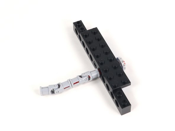 Connect a second universal joint to the other end of the axle.