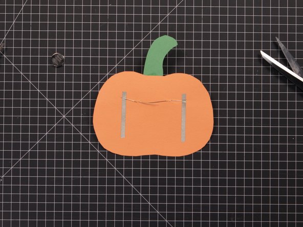 Add Maker Tape so the two shorter (negative) legs on the outside are connected with a third piece of tape forming a “U” shape.