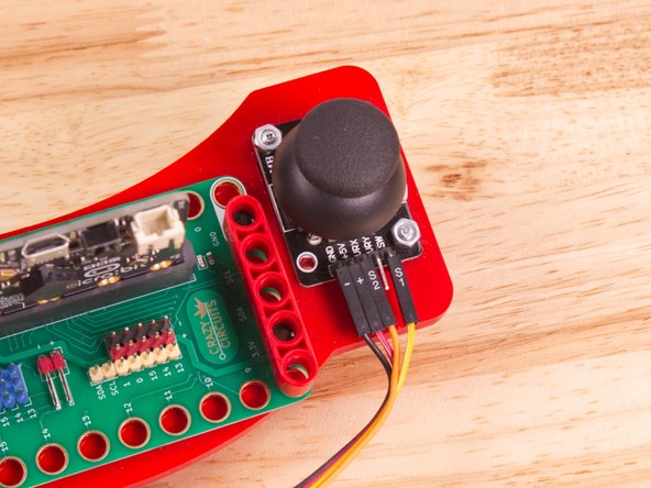 Connect the black wire (-) to GND on the Thumbstick.