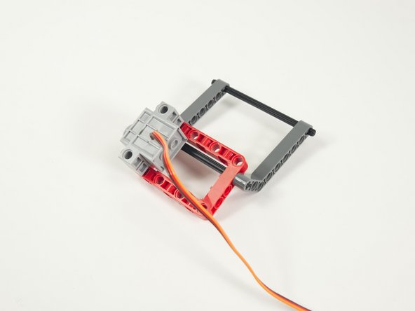 Note that the shaft of the servo is towards the back of the Lifter and the wires are on top of the servo.