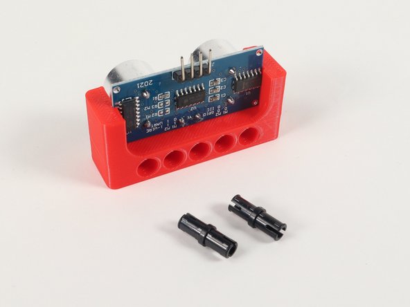 The Distance Sensor Holder has mounting holes on the bottom as well as the back side.