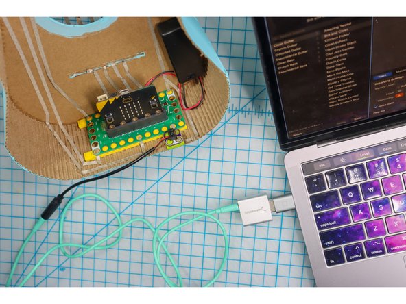 Connect an audio cable, and insert the other end into your computer. Tip: on some computers, you may need a USB audio interface, like the one pictured.