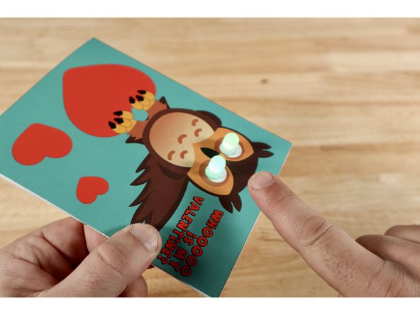 Remember: This card is designed so that the eyes ONLY light up when both layers of the card are pinched at the wing tip as shown.