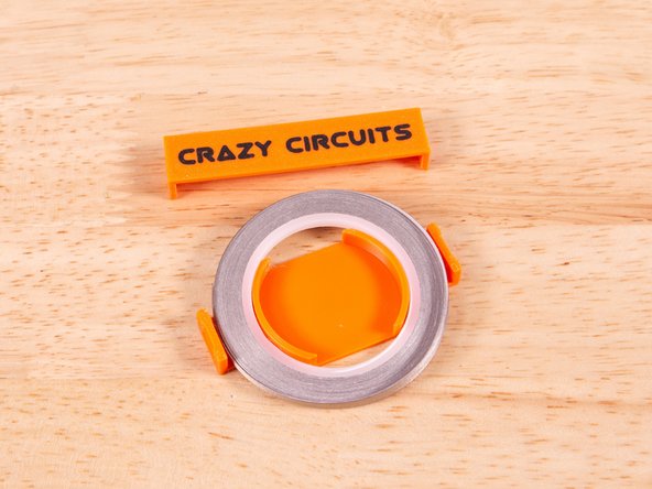 The latest version of our Small Tape Roll Holder (v3) has been simplified. It now consists of the main body and a single clip. There is less chance of the tape getting tangled or twisted now.