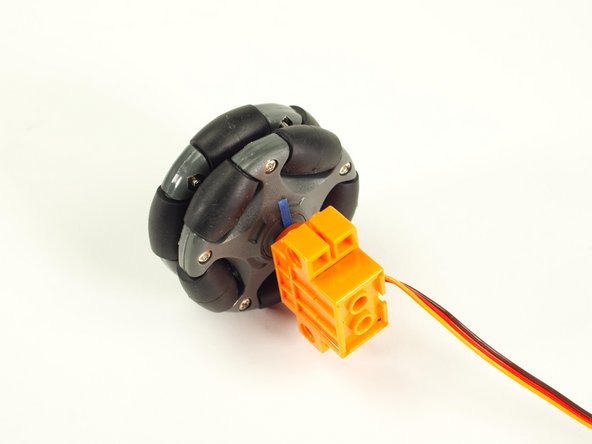 Press the tape down into the plus hole using a small tool (a tiny screwdriver, toothpick, etc.)