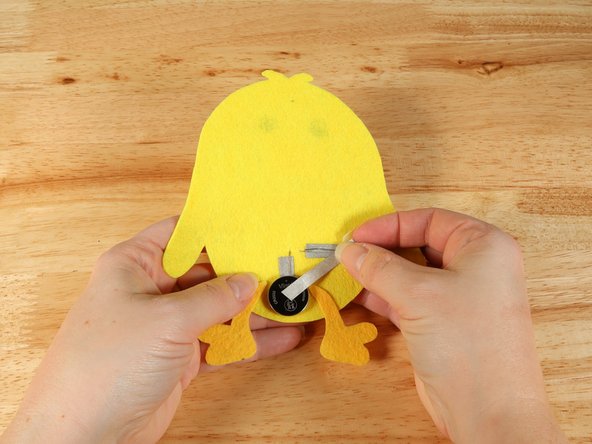 Add Maker Tape to connect the top (Positive) side of the battery to the Positive LED leg path.