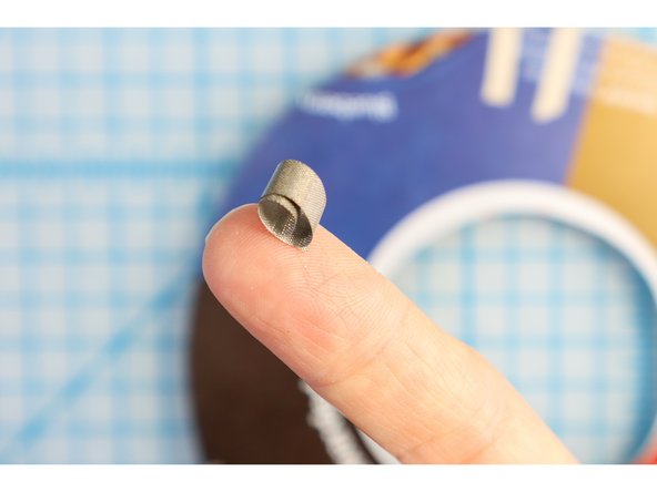 Turn the project over to add the battery. Mark the positive and negative on the back so that you remember which is which.