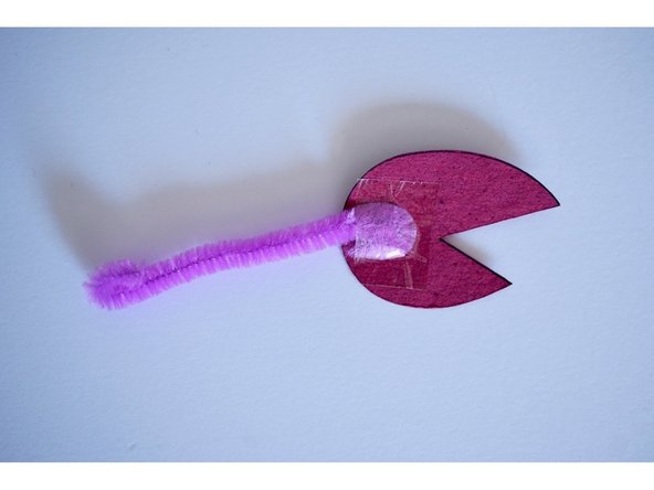 Cut two short pieces of pipe cleaner.