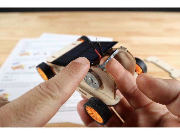 Change the direction the motor spins by disconnecting standard black to black/ red to red wiring and rewiring black to red.