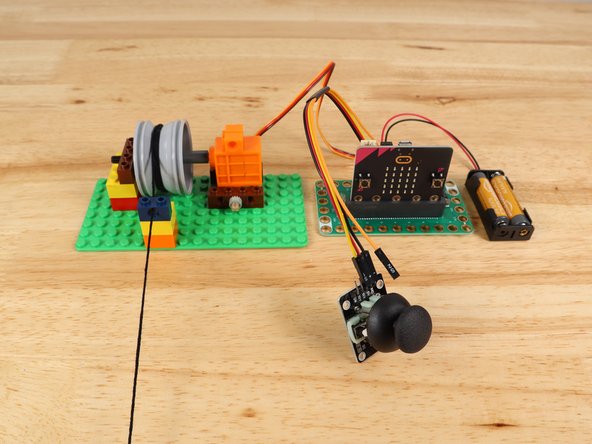 For the thumbstick we don't need any Maker Tape or a LEGO baseplate. We'll just plug the thumbstick into the pin headers on the back of the Bit Board using the Crazy Circuits Ribbon Cable.