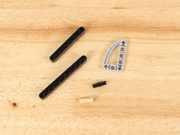 Assemble the LEGO parts to build the gate arm.