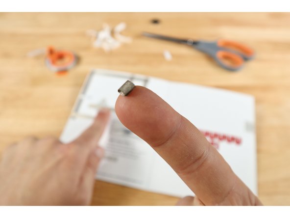 Measure, cut, and peel a piece of Maker Tape using the graphic for path "J". Use that tape to create a tape loop that is "sticky-side-out".