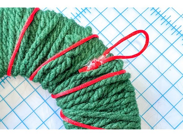 I also used the red cable to make a hanger.