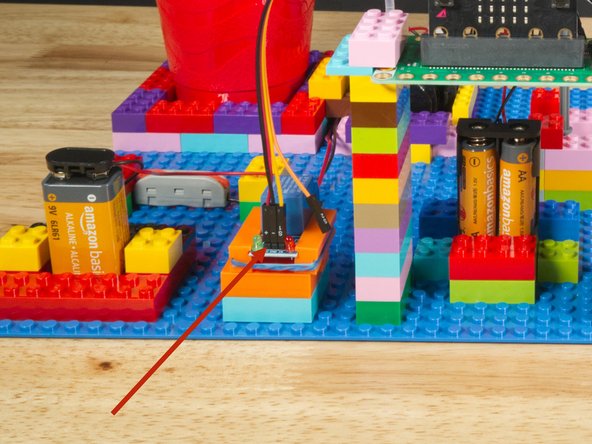 The Red wire will go into the VCC Pin.