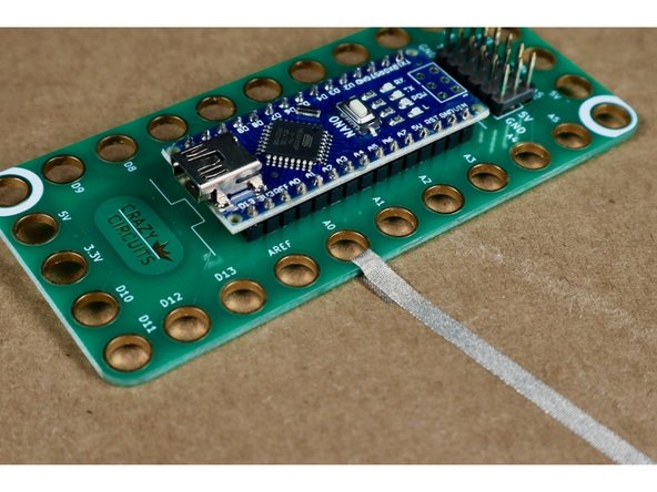 Use 1/8th Inch Maker Tape to connect to an output pin on a Crazy Circuits Board.