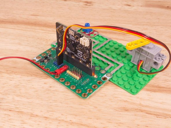 Then the Brown Wire should be closest to the micro:bit (in the - row) and the Red Wire will be in the middle (the +5v row).