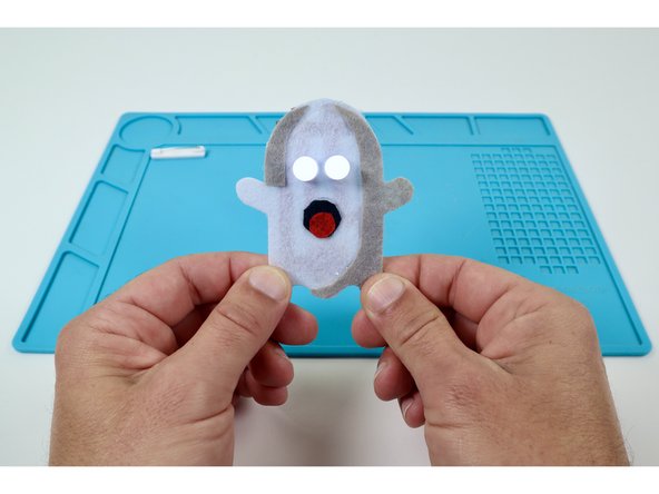 Stick that safety pin where shown in photo 2. 