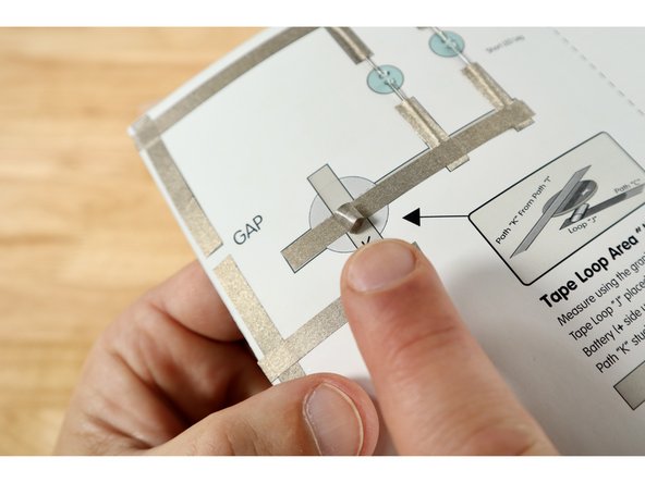 Stick that Maker Tape Loop atop path "C" somewhere within the battery graphic on the diagram.
