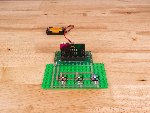 The NeoPixels need to be chained together. You'll notice the labels DI and DO on each one. These stand for Digital Input and Digital Output.